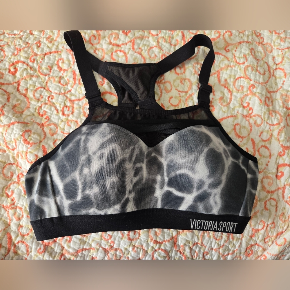32B Black and Gray Sports Bra. Padded. Strappy Back. See Through Mesh Above Cups